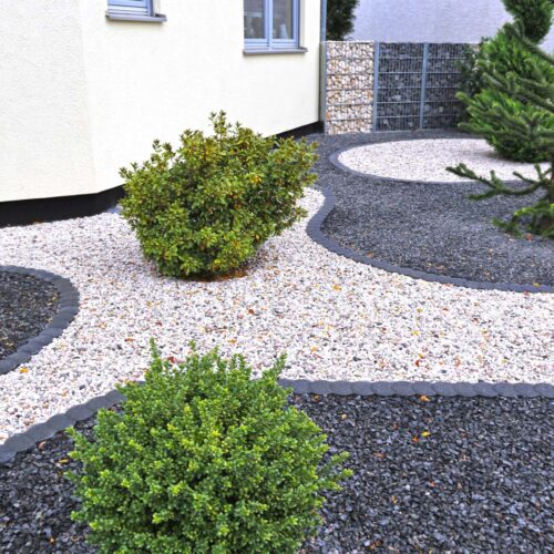 Modern front garden with decorative gravel